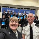 Supt Helen Waite and PC Lee Marston pose for a selfie in front of the cadets with their certificates