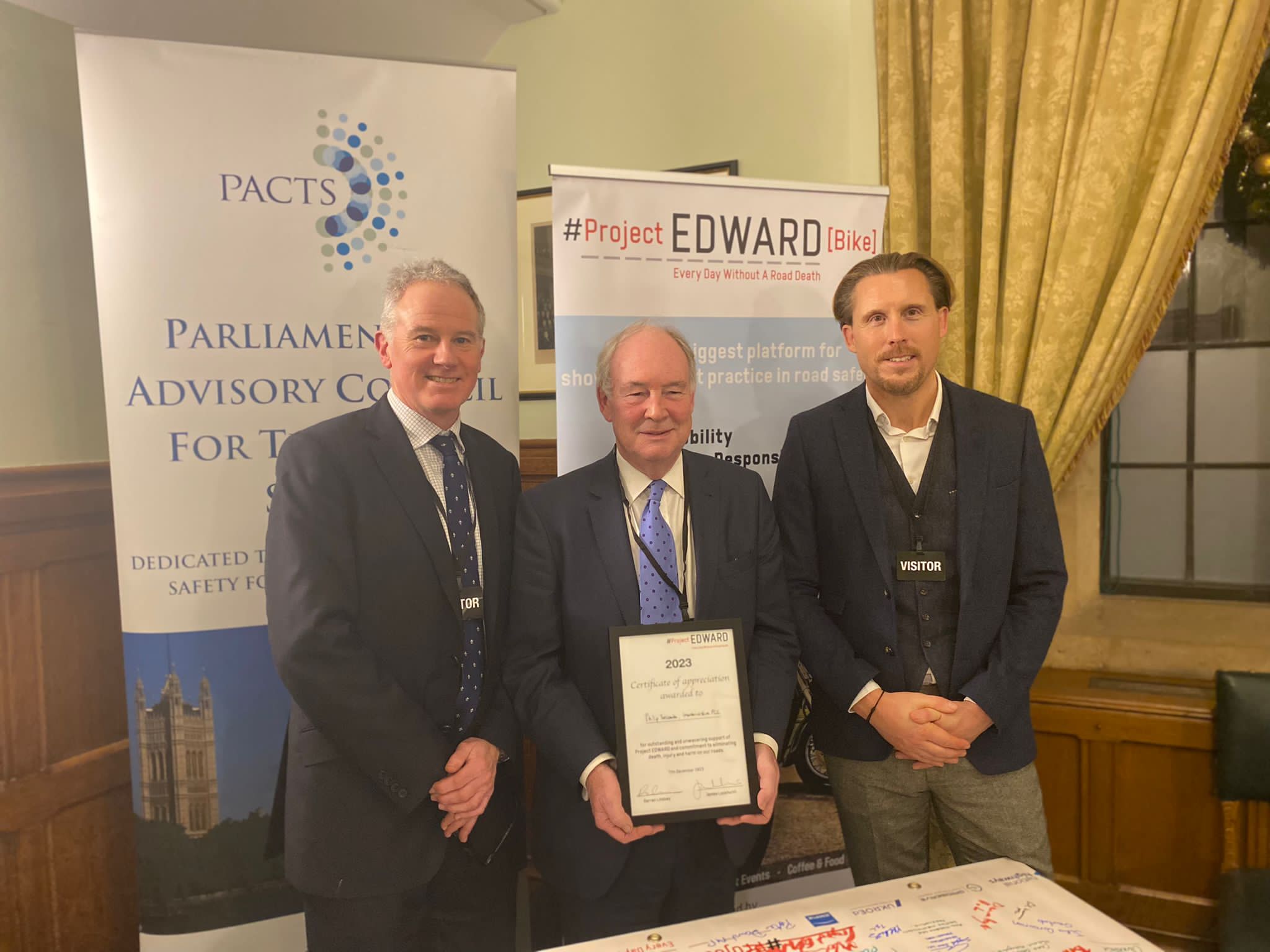 Warwickshire Police and Crime Commissioner Philip Seccombe (centre) receiving the award from Project EDWARD’s James Luckhurst (left) and Darren Lindsey (right)