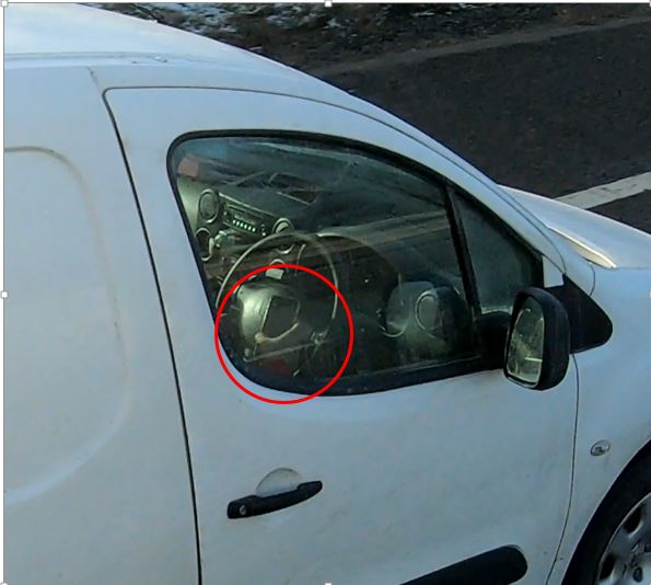 Van driver with mobile phone M40, February 2021